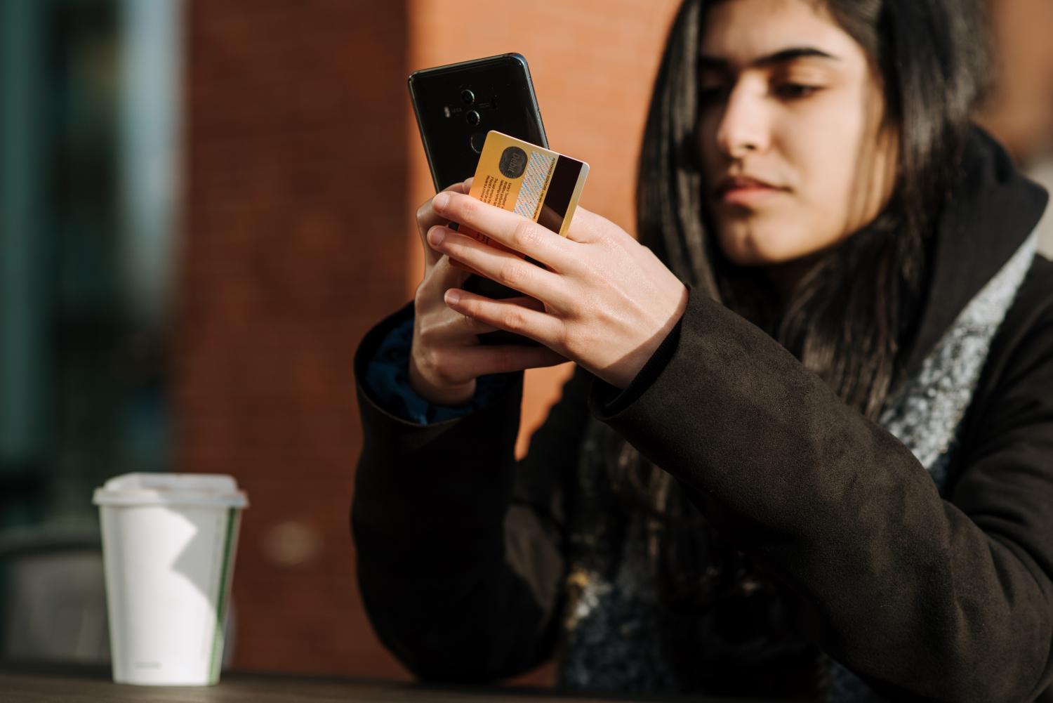 girls shopping on phone