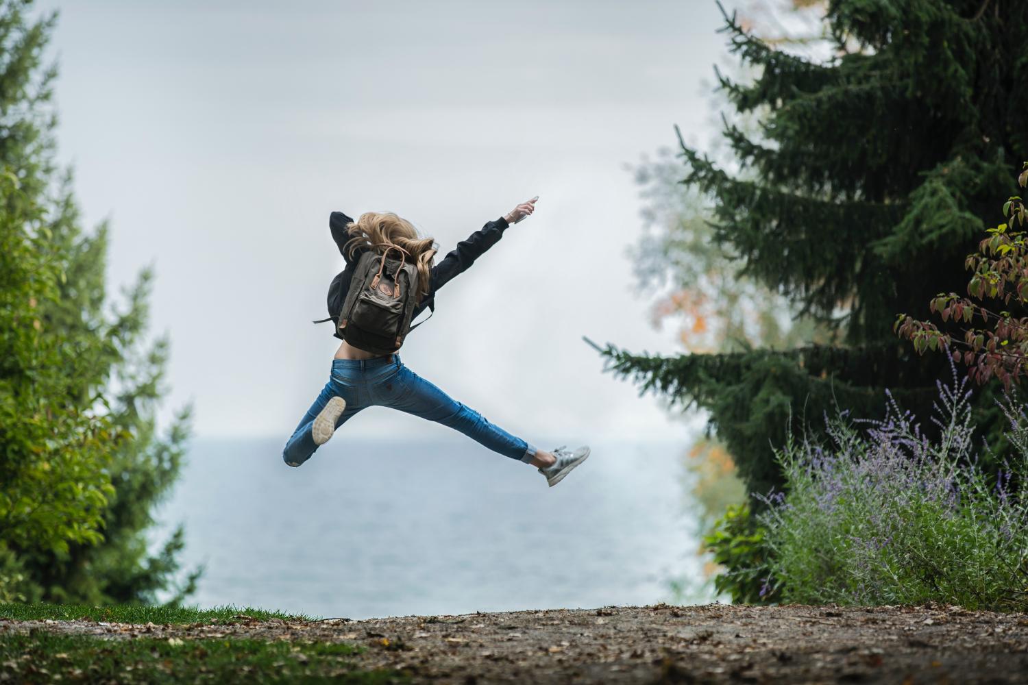 Happy jumping woman